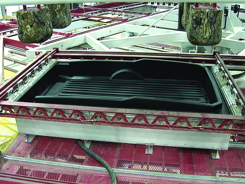 Large-format thermoformed cargo component for Class 8 trucking OEM